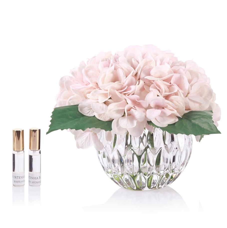 Perfumed bouquet of hydrangeas in transparent vase Blush