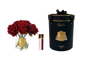 Parfumed bouquet of 7 roses in transparent vase